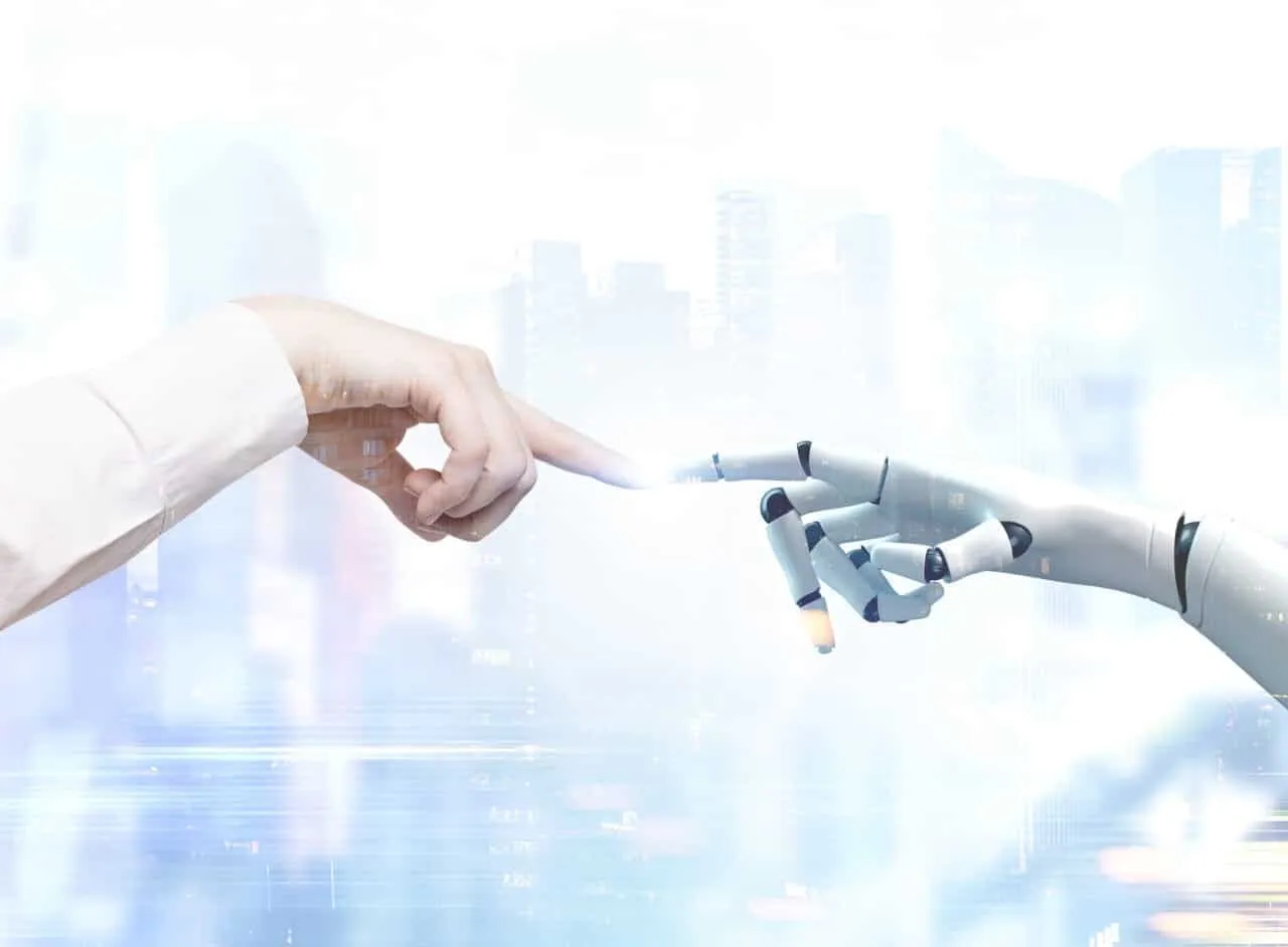 Human and robot hands reaching out, blurred city
